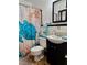 Bathroom sink with soap dispenser and turtle themed shower curtain at 1500 Brent Ct # 9B, Burlington, NC 27215
