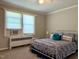 Bedroom featuring a bright window and comfortable bed at 1500 Brent Ct # 9B, Burlington, NC 27215