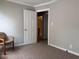 A spacious bedroom with a chair and view into another room at 1500 Brent Ct # 9B, Burlington, NC 27215