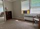 This bedroom has a large window allowing for a lot of natural light at 1500 Brent Ct # 9B, Burlington, NC 27215