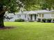 Charming duplex with well-maintained lawn and landscaping offers great curb appeal and comfortable living at 1500 Brent Ct # 9B, Burlington, NC 27215