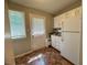Cozy kitchen featuring white appliances and ample natural light at 1500 Brent Ct # 9B, Burlington, NC 27215