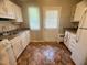Functional kitchen with countertop space, sink, and cabinets at 1500 Brent Ct # 9B, Burlington, NC 27215