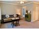 Inviting living room with sofa, coffee table and view to hall and bonus room at 1500 Brent Ct # 9B, Burlington, NC 27215