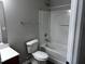 Clean bathroom features a vanity, toilet and tub shower combination at 1527 Haywards Heath Ln, Apex, NC 27502