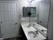 Double vanity with matching mirrors in this spacious bathroom at 1527 Haywards Heath Ln, Apex, NC 27502