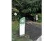 Community entrance on Haddon Hall Drive with walking trail in a wooded area at 1527 Haywards Heath Ln, Apex, NC 27502