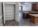 A walk-in pantry in the kitchen with wire shelves offers ample storage space at 1527 Haywards Heath Ln, Apex, NC 27502
