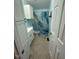 Bathroom features white cabinets, and a shower with a blue marble curtain at 195 Windsong Ln, Youngsville, NC 27596