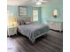 Comfortable bedroom featuring ample natural light, neutral decor, and stylish furnishings at 195 Windsong Ln, Youngsville, NC 27596