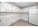 Full view of the kitchen with an abundance of cabinets and countertop space perfect for storage and meal prep at 202 Crest Rd, Cary, NC 27513