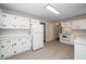 Full view of the kitchen showcases modern appliances, plentiful storage and updated flooring throughout the space at 202 Crest Rd, Cary, NC 27513