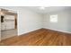 Inviting open-concept living space with hardwood floors and a ceiling fan at 202 Crest Rd, Cary, NC 27513