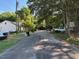 A serene street view showcasing the neighborhood's tree-lined streets at 207 2Nd St, Erwin, NC 28339