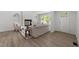 Inviting living room with fireplace, built-in shelving, hardwood floors and natural light at 216 Burkwood Ln, Raleigh, NC 27609