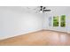 Bright bedroom with hardwood floors and a window offering natural light at 2205 Landings Way, Raleigh, NC 27615