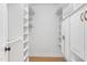 Spacious walk-in closet with built-in shelving and storage at 2205 Landings Way, Raleigh, NC 27615