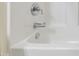 Close up of a bathtub faucet with chrome finish and a clean white tub at 222 Ashton Hall Ln, Raleigh, NC 27609