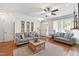 Open living area with hardwood floors, neutral furniture, and lots of natural light at 222 Ashton Hall Ln, Raleigh, NC 27609