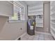 Utility room featuring a water heater and ample shelving at 3009 Wellington Dr, Rocky Mount, NC 27803