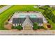 Aerial view of community pool area with ample seating, perfect for relaxation and social gatherings within the community at 305 Slate Dr, Gibsonville, NC 27249