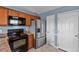 Modern kitchen featuring stainless steel appliances and plenty of counter space for all your culinary needs at 305 Slate Dr, Gibsonville, NC 27249