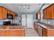A well-lit kitchen with stainless appliances, ample cabinets, and a convenient layout for cooking and entertaining at 305 Slate Dr, Gibsonville, NC 27249