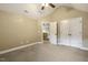 Neutral bedroom with a ceiling fan, carpet, and closet at 347 Country Mill Way, Fuquay Varina, NC 27526