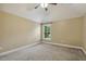 Spacious bedroom with carpet, neutral walls, a window, and lots of natural light at 347 Country Mill Way, Fuquay Varina, NC 27526