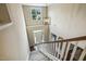 Bright foyer with high ceilings, white staircase, a pendant light and a large window at 347 Country Mill Way, Fuquay Varina, NC 27526
