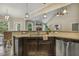 Kitchen with a large sink, stainless steel dishwasher, and stunning granite countertops at 347 Country Mill Way, Fuquay Varina, NC 27526