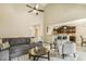 Bright and airy living room with an open layout, seamlessly connecting to the kitchen and dining areas at 347 Country Mill Way, Fuquay Varina, NC 27526