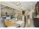Open-concept living space featuring dining, kitchen, and living areas with modern finishes and plenty of natural light at 347 Country Mill Way, Fuquay Varina, NC 27526
