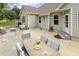 Backyard patio with outdoor seating and dining area at 347 Country Mill Way, Fuquay Varina, NC 27526