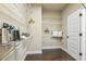Walk-in closet with wire shelving offers ample storage and organization with a solid door at 347 Country Mill Way, Fuquay Varina, NC 27526