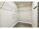 A walk-in closet provides plenty of storage with wire shelving and a finished floor at 347 Country Mill Way, Fuquay Varina, NC 27526