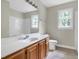 Neutral bathroom with a single sink vanity, a toilet and a shower-tub combo at 3511 Shady Creek Dr, Durham, NC 27713