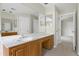 Bathroom featuring a marble countertop vanity with a sink and a large mirror at 3511 Shady Creek Dr, Durham, NC 27713