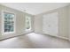Spacious bedroom with two windows letting in lots of light and double door closet at 3511 Shady Creek Dr, Durham, NC 27713