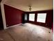 Spacious bedroom with two windows, ample space, and neutral walls at 4040 Tyler Dr, Oxford, NC 27565