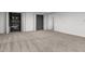 Large basement space with neutral carpet, providing ample room for various activities and storage at 4110 Stoneycreek Rd, Chapel Hill, NC 27514
