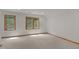 Bright, neutral bedroom featuring wall to wall carpet and natural light from two windows at 4110 Stoneycreek Rd, Chapel Hill, NC 27514