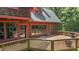 Gorgeous wood home with expansive windows and a large deck that enhances the appeal of outdoor living at 4110 Stoneycreek Rd, Chapel Hill, NC 27514
