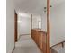 Hallway on the second floor featuring carpeted floors and wooden railings and supports at 4110 Stoneycreek Rd, Chapel Hill, NC 27514