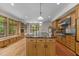Bright kitchen featuring a large island, stainless steel appliances and generous natural light at 4110 Stoneycreek Rd, Chapel Hill, NC 27514