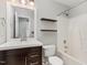 This bathroom features a modern vanity, a large mirror, and a shower/tub combo at 5437 Advantis Dr, Raleigh, NC 27610