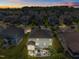 Backyard aerial showcasing a screened porch and patio perfect for outdoor entertaining at 633 Copper Beech Ln, Wake Forest, NC 27587