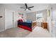 Cozy bedroom with nautical theme, ceiling fan, and natural light from the window at 633 Copper Beech Ln, Wake Forest, NC 27587