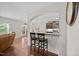 Open kitchen view with bar seating and granite counters at 633 Copper Beech Ln, Wake Forest, NC 27587