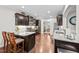 Well-appointed kitchen with granite countertops, stainless steel appliances, and dark cabinetry, open to the breakfast nook at 633 Copper Beech Ln, Wake Forest, NC 27587